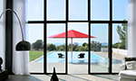 Riesiger Sonnenschirm Gastroschirm Big-Ben rund in rot von Caravita im Pool