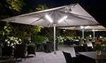 Riesiger Sonnenschirm Gastroschirm Big Ben von Caravita quadratisch mit Beleuchtung Elegance Hotel Kempinski